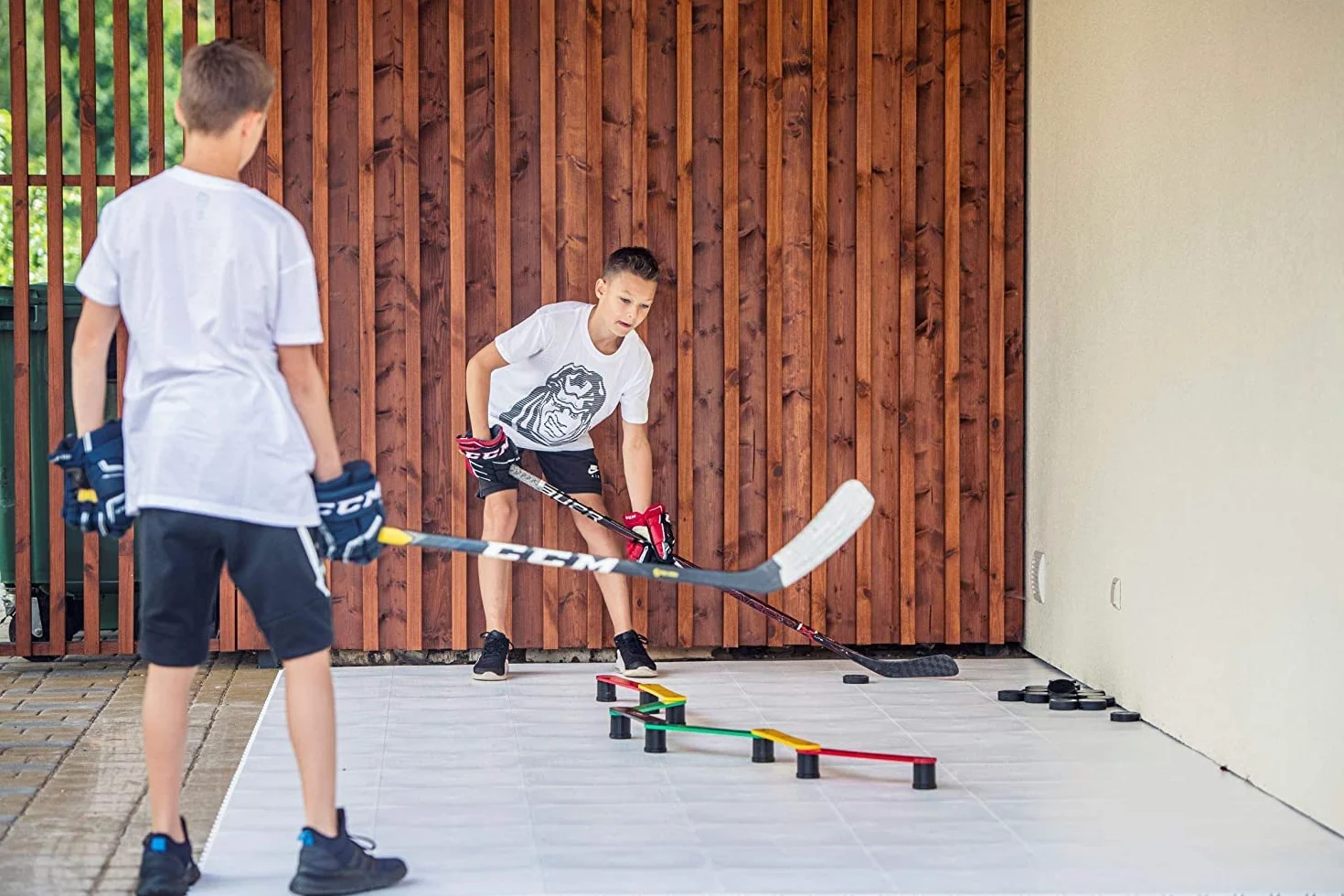 Hockey Revolution Aide à la Manipulation des bâtons, contrôle du Palet, Temps de réaction et équipement de Coordination – Durable, léger, Portable et réglable avec de Nombreuses Combinaisons Peuvent