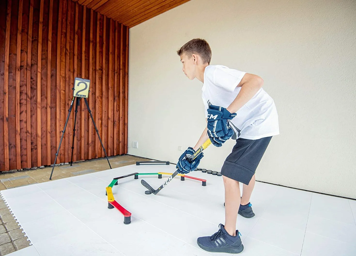 Hockey Revolution Aide à la Manipulation des bâtons, contrôle du Palet, Temps de réaction et équipement de Coordination – Durable, léger, Portable et réglable avec de Nombreuses Combinaisons Peuvent