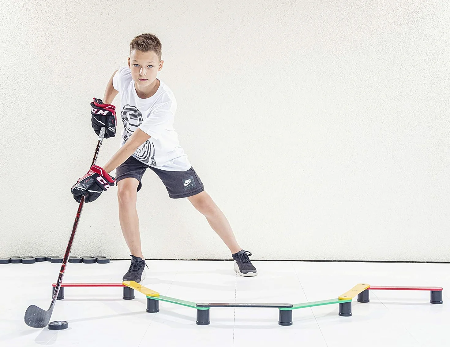 Hockey Revolution Aide à la Manipulation des bâtons, contrôle du Palet, Temps de réaction et équipement de Coordination – Durable, léger, Portable et réglable avec de Nombreuses Combinaisons Peuvent